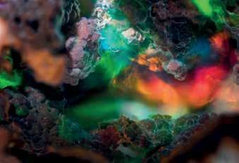 Opal from Magdalena. Jalisco, Mexico. Field of view 3.05 mm.
