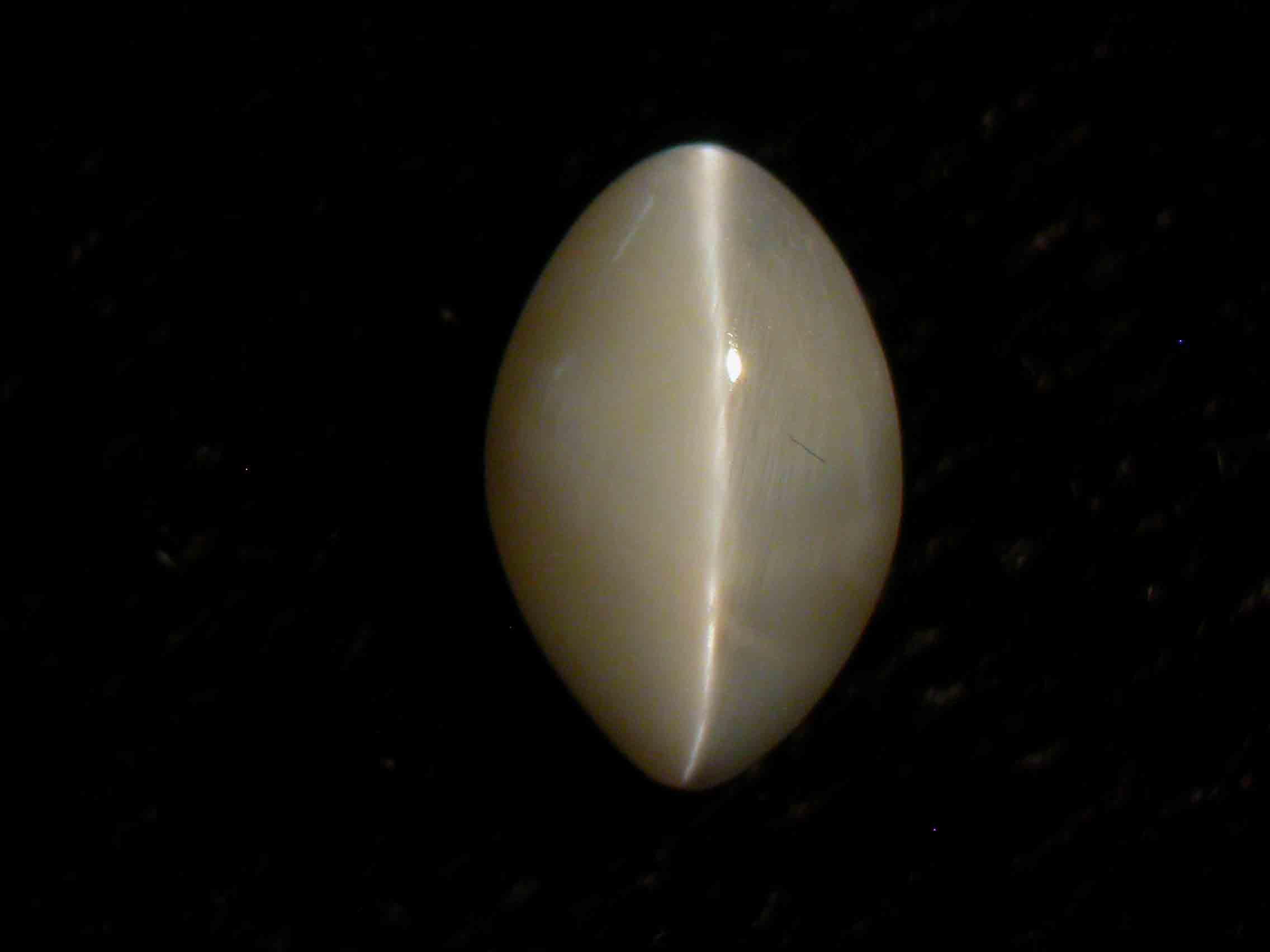 Understanding the Cat's Eye Effect in Gemstones - - Chrysoberyl cabochon Cats eye Gem A PD Blog