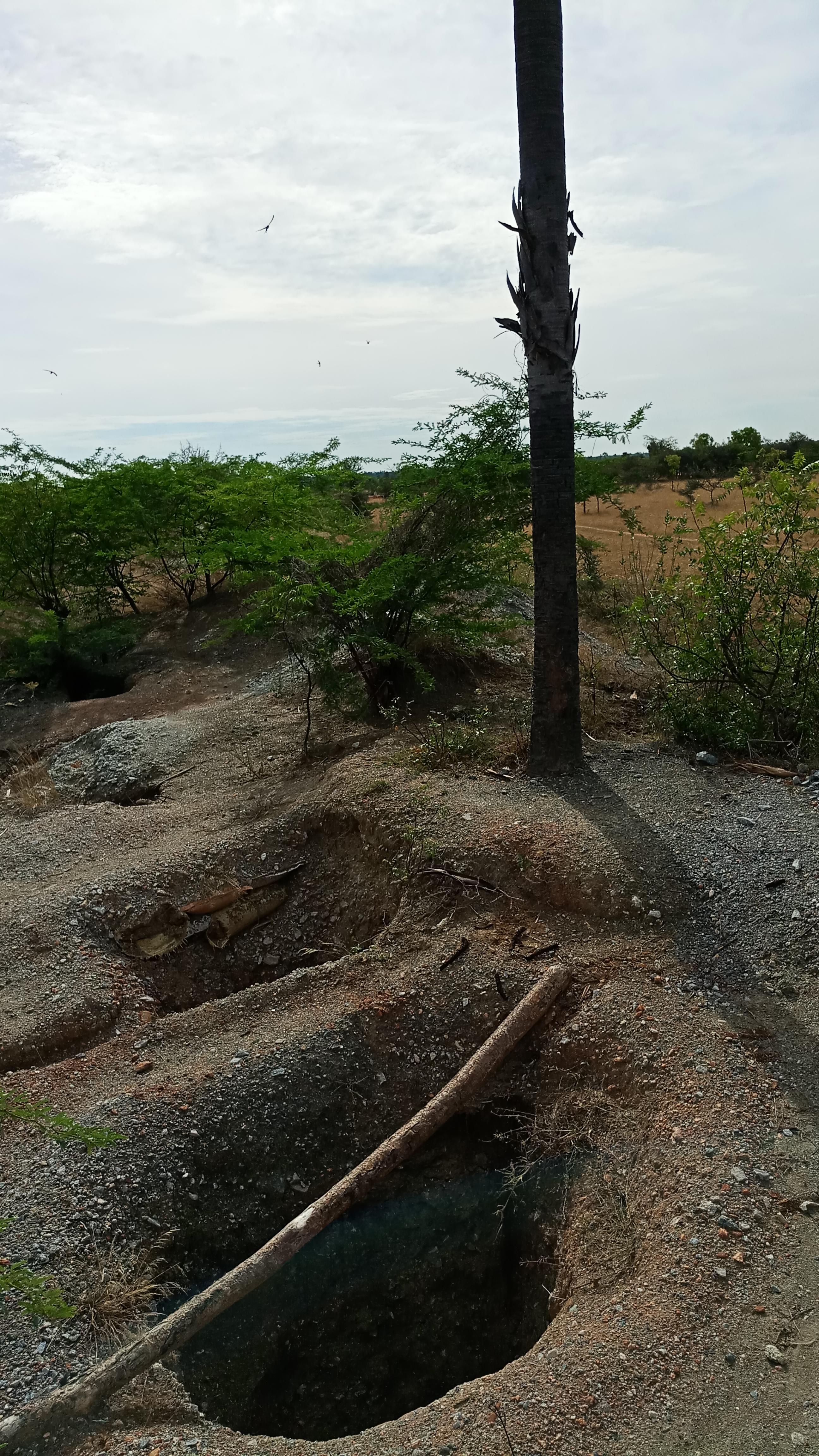 A Journey into the Blues of Iolite from Tamil Nadu - - iolite mining shaft entrance Gem A Blog