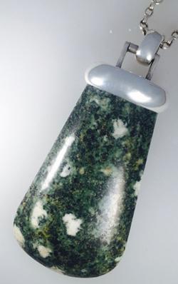 Pendant made from Preseli spotted dolerite, made in China. Preseli bluestone blogpost.