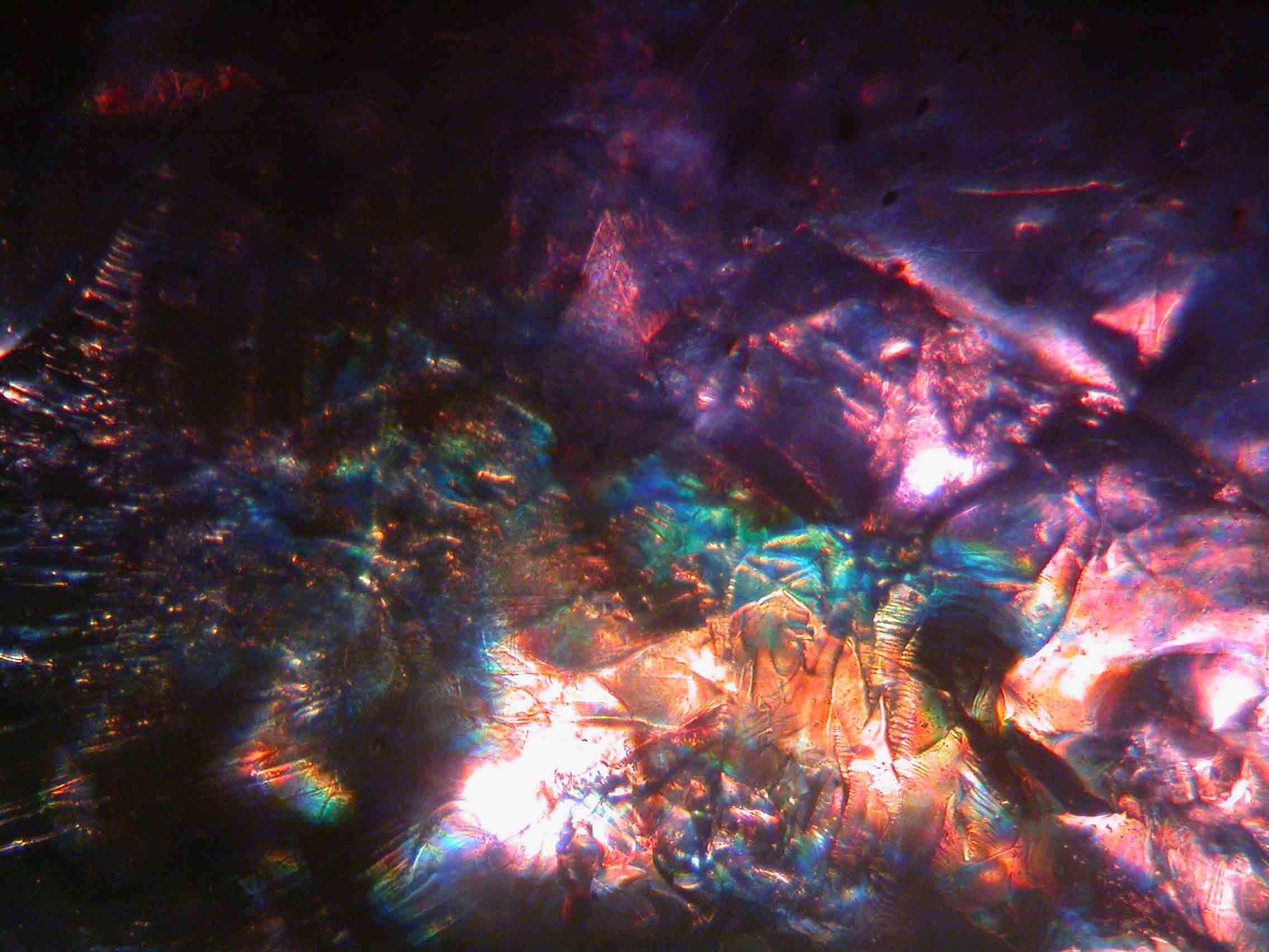 Understanding Common Corundum Treatments - - Corundum Ruby Treated Glass Filled Iridescence in Direct Light 3319 PD