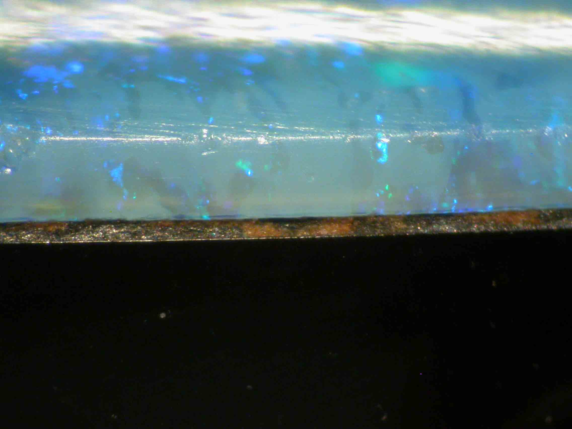 Understanding Precious Black Opal and its Properties - - Opal Simulant Doublet