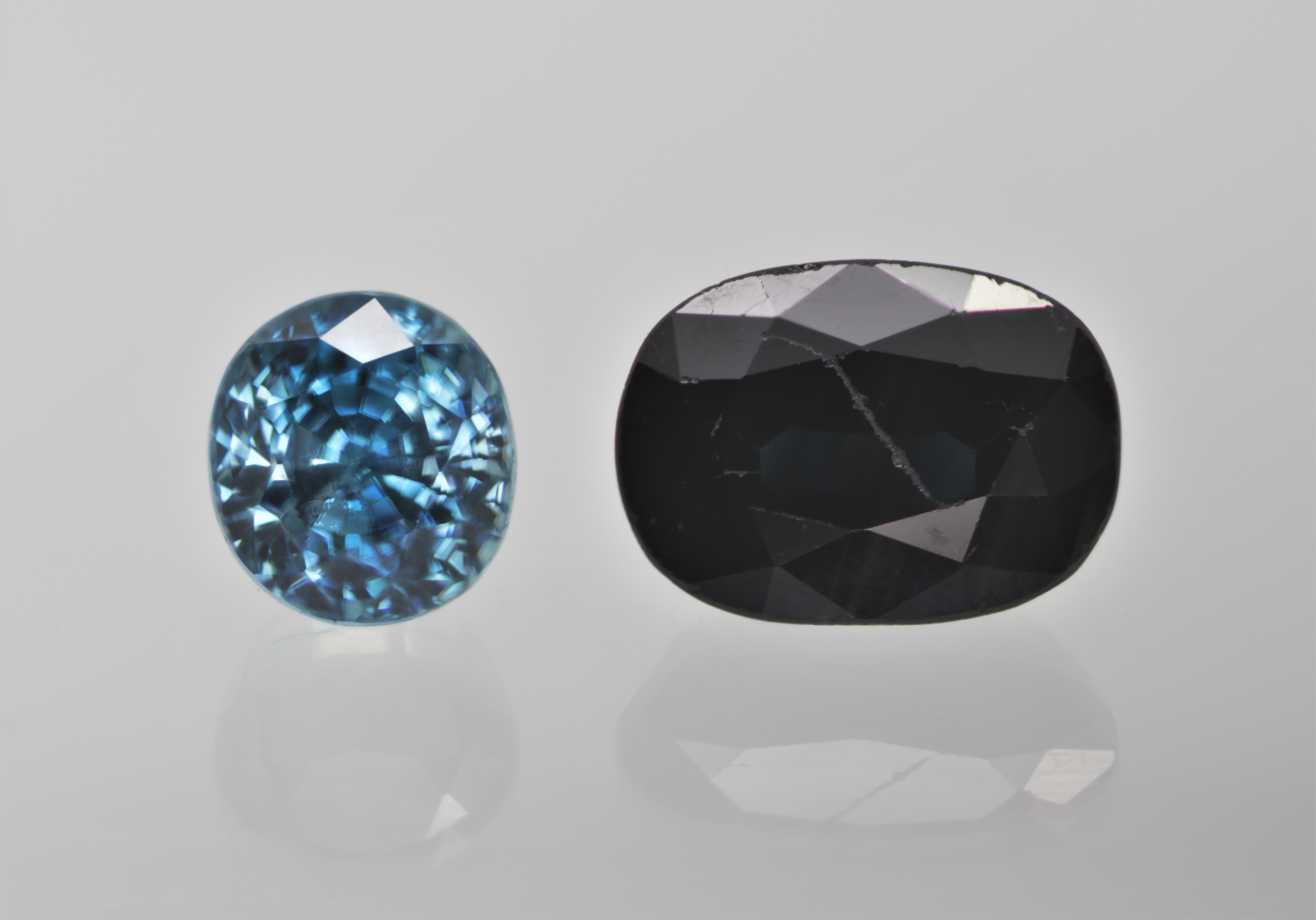 Understanding Zircon: A Misunderstood Gemstone with Amazing Properties - - fine zircon next to sapphire CB