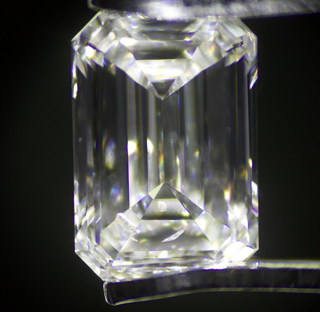 emerald-cut style diamond with feather inclusion